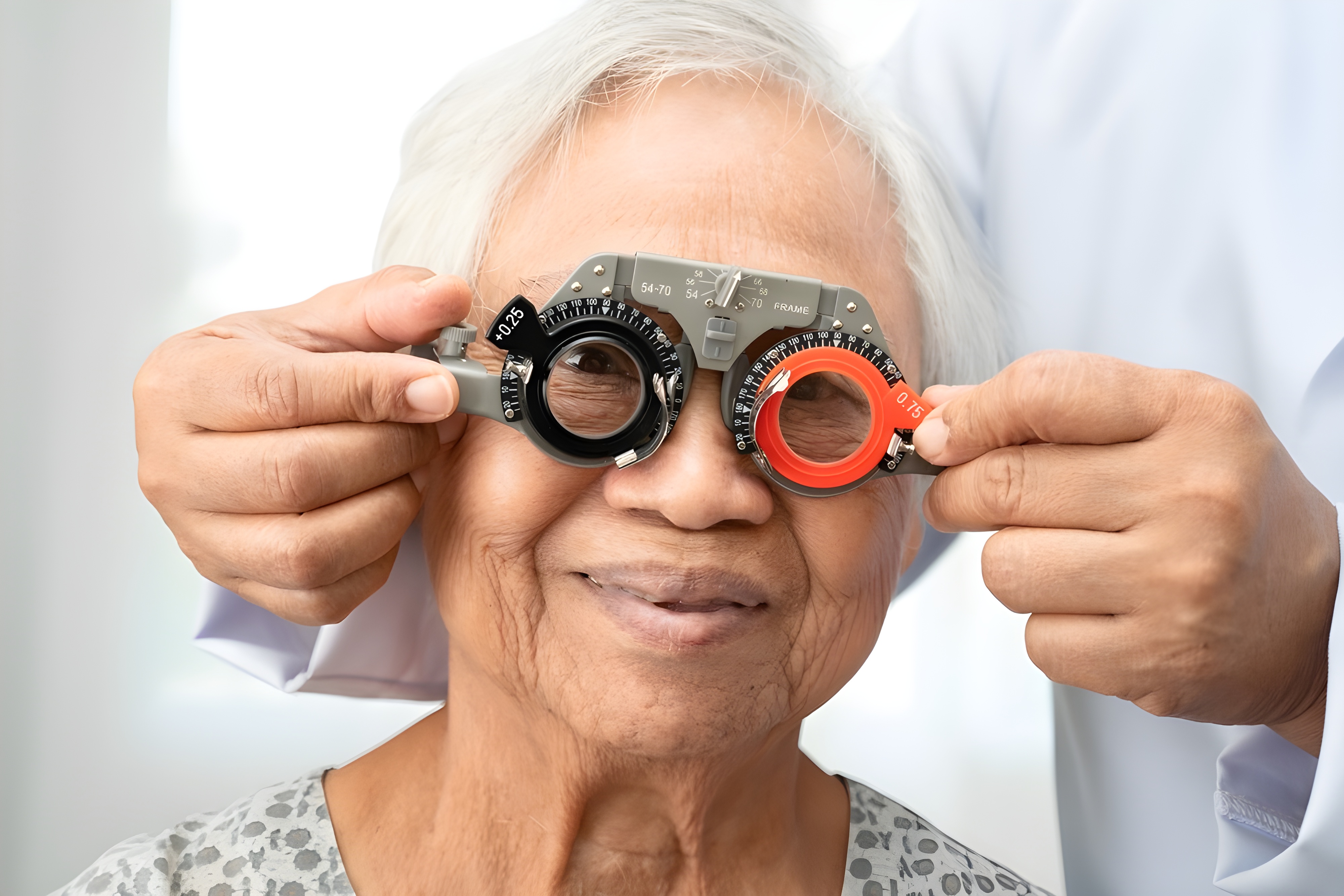 Elderly man receiving an eye exam